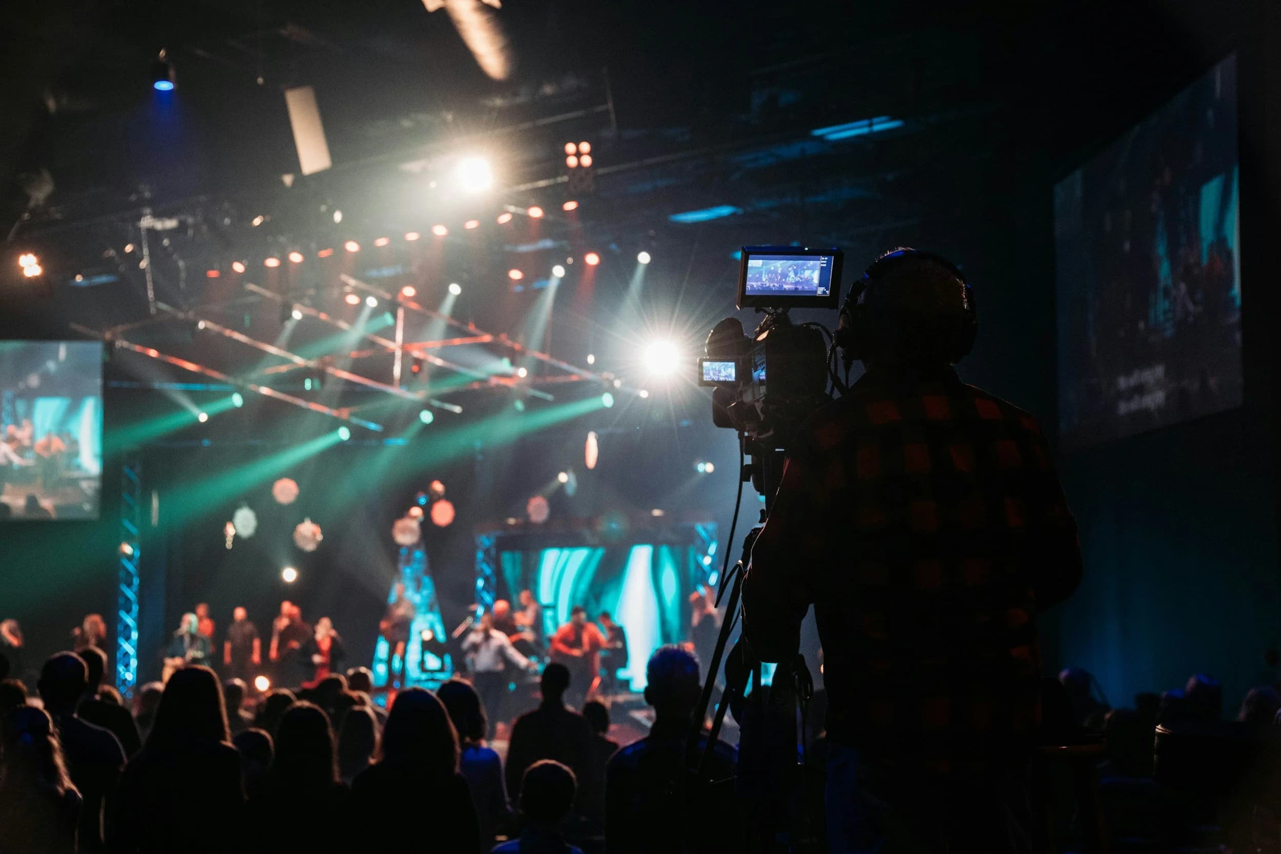 Camera operator framed against our LED IMAG screens at an Ottawa concert