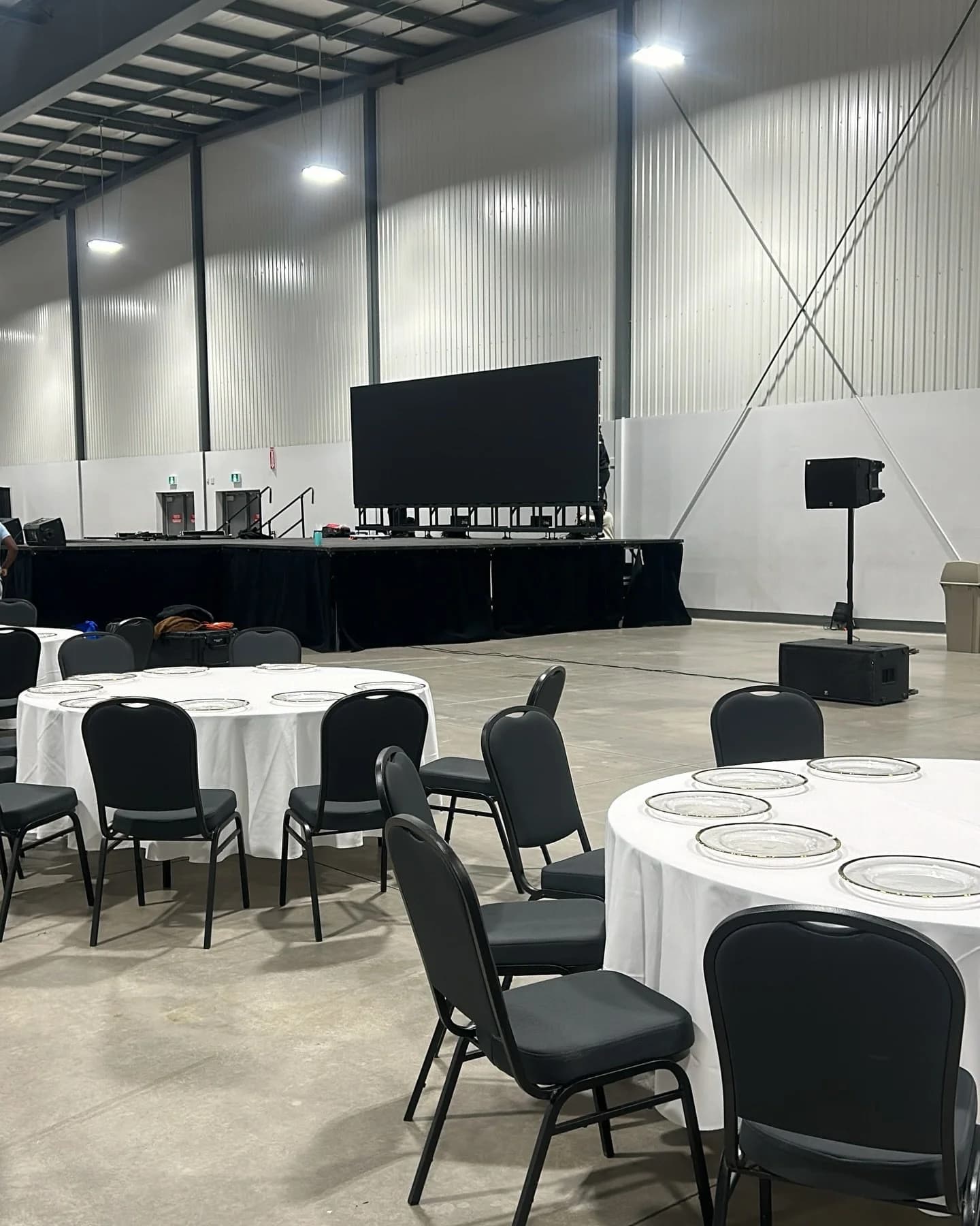 Large Ottawa event venue with audience seating and a bright LED wall stage setup for a branded activation